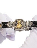 Браслет из серебра 925 пробы и золота 750 пробы c кожаным шнурком и ониксом